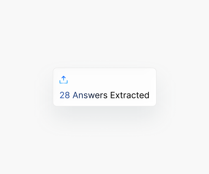Person at a desk with a notification showing 28 answers extracted into the library